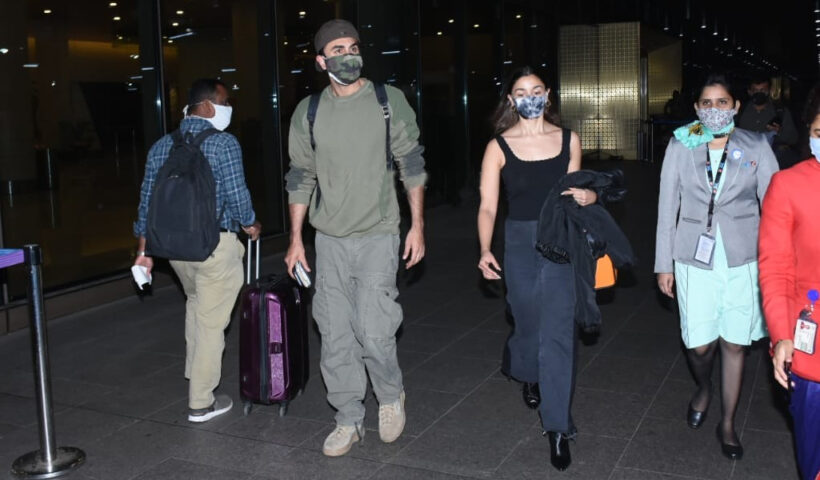 Alia Bhatt and Ranbir Kapoor make for a perfect couple as they arrive back in Mumbai from New Year trip; PICS